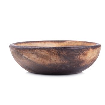 Old handmade carved wooden bowl isolated on white background.