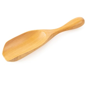 Wooden spoon isolated on a white background.