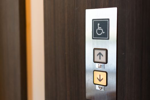 Disabled sign in the lift