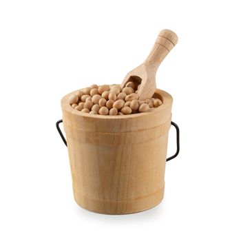 Soybeans in wooden bucket isolated on a white background.