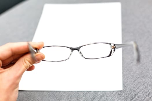 Glasses on paper with the engineer's office.