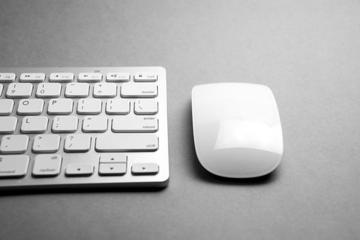 Modern & white computer mouse and keyboard