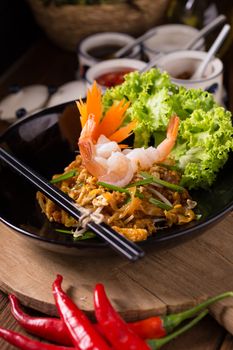 Fried noodle Thai style with prawns Stir fry noodles with shrimp in Pad Thai Thai noodle style Traditional food