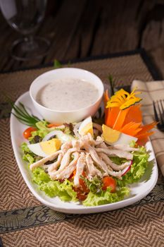 Fresh green salad with chicken and lettuce Fresh summer background Healthy eating.