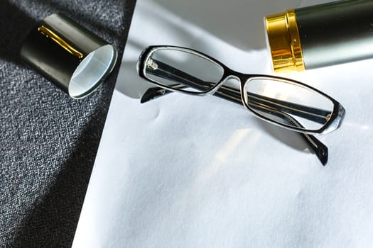 Glasses on paper with the engineer's office.