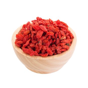 Goji berries in wooden bowl isolated on white background.