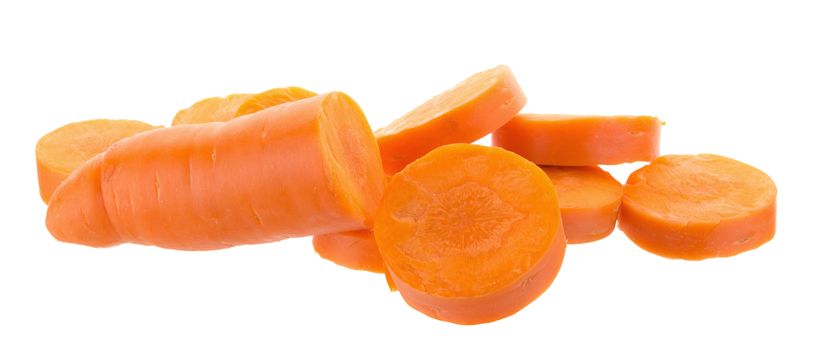 fresh carrots with slices of carrot on the white background.