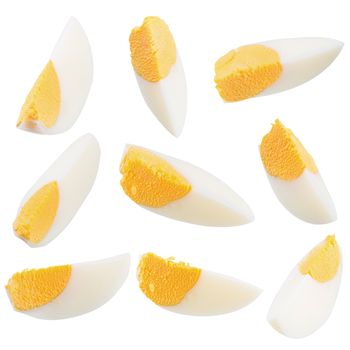 Boiled egg split on a white background.