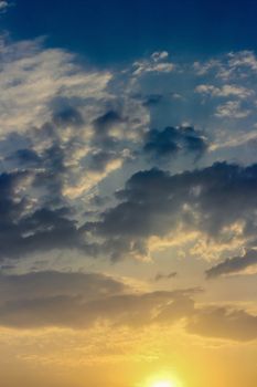 Colorful dramatic sky with cloud at sunset.Sky with sun background