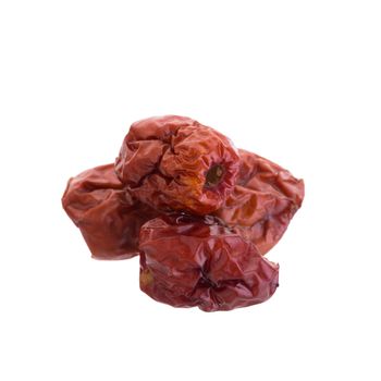 Dried jujube fruits chinese herbal medicine on a white background.