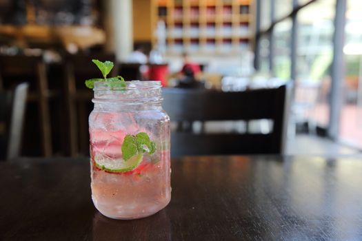 strawberry cocktail on wood background