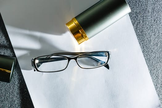 Glasses on paper with the engineer's office.