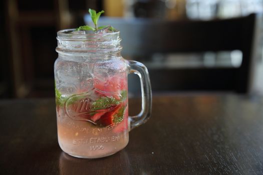 strawberry cocktail on wood background