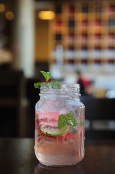 strawberry cocktail on wood background