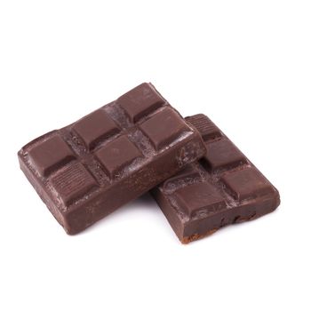 Chocolate bar pieces on white background.