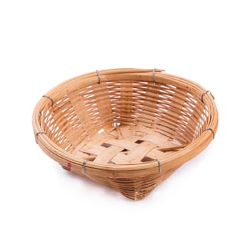 empty bamboo basket on a white background.