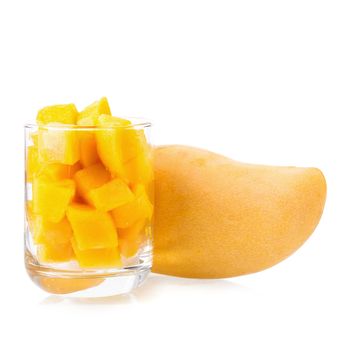 Mango fruit and mango cubes on the white background.