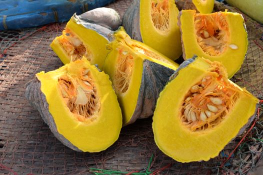 Pumpkin Thai, cut into pieces and put on the market in Thailand.