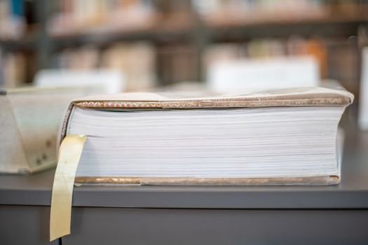 books on a shelf in a public library ready to study