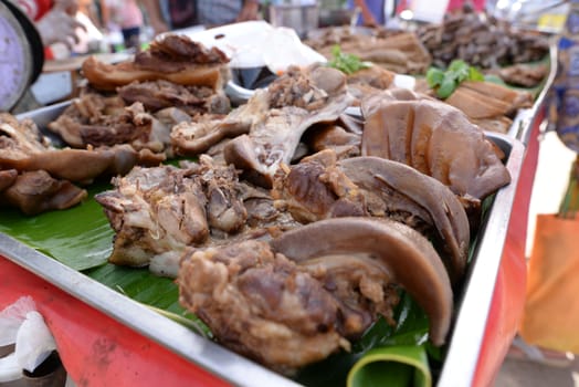 Boiled pork, meat from the head of the pork, On a stall in rural Thailand.