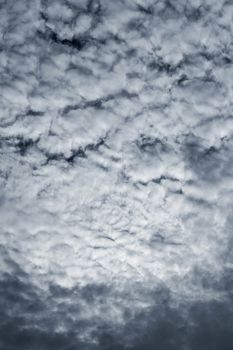 Dramatic sky with stormy clouds before rain and thunderstorm.