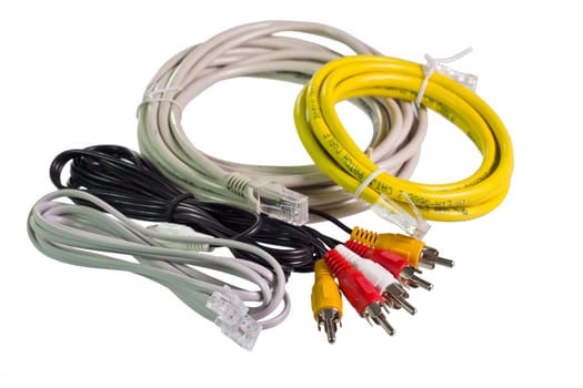 Many kinds and colors of cables and wires on white background