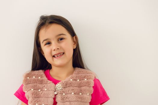 Portrait of a happy smiling child girl