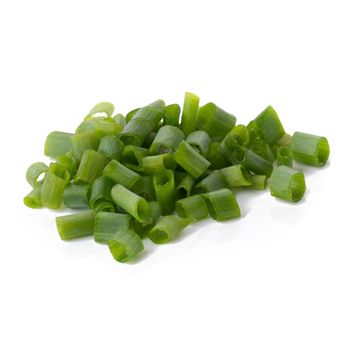 Chopped fresh green onions isolated on white background.