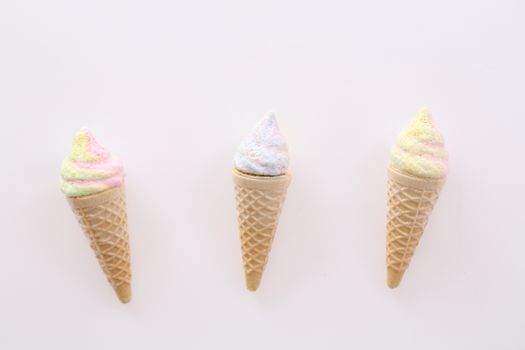 Mini ice cream cone candy isolated in white background