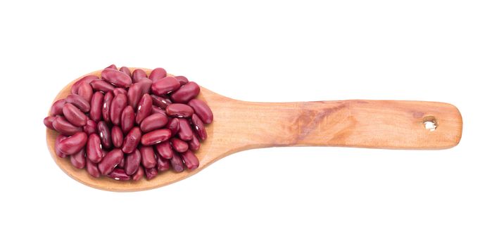 Red bean in a wooden spoon isolated on a white background.