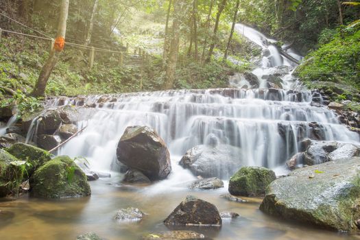 Deep forest waterfall National Park in Lampang Thailand.