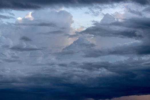 Dramatic sky with stormy clouds before rain and thunderstorm.