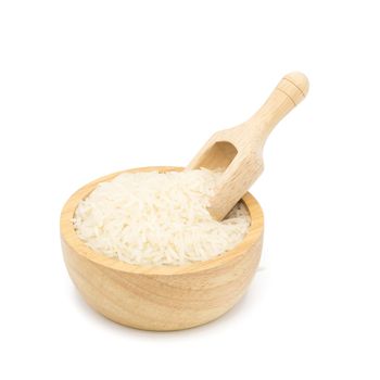 Rice in a wooden cup isolated on white background.