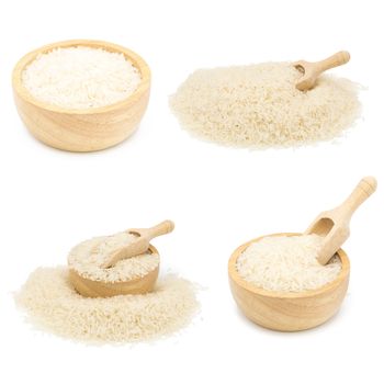 Rice in a wooden cup isolated on white background.
