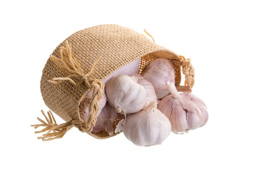 Garlic In the basket isolated on a white background.