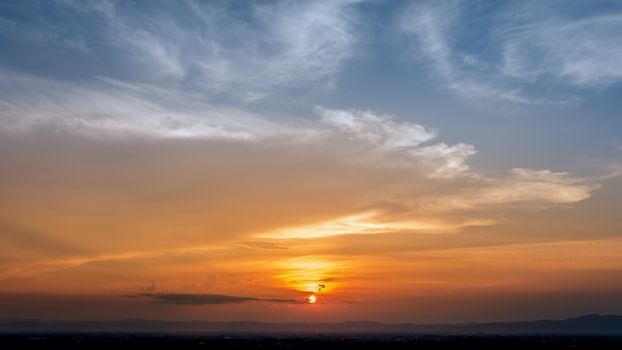 Time Lapse of Colorful dramatic sky with cloud at Sunrise.Sky with sun background