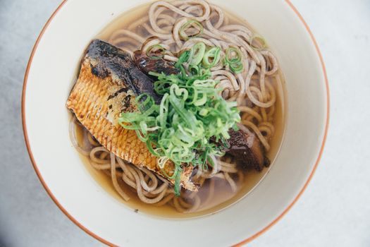 Soba noodles soup with Mackerel or Saba in Japanese on film vintage style japanese food