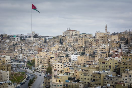 Cityscape and skyline of Amman in Jordan, with view on the Raghadan Flagpole