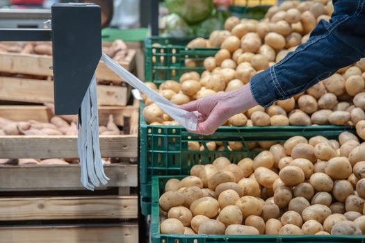 Fresh vegetables on supermarket shelves and in markets in crates from farmers