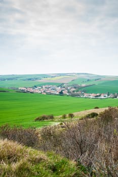 view on the landscape and the village l' Escale when mounting the cliff of Cap Blanc Nez in springtime in the region of Nord Pas de Calais