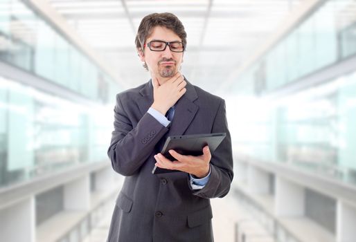 businessman using touch pad of tablet pc, at the office