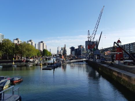 Rotterdam, Netherlands, September 2019: View on the Leuvehaven on a beautiful indian summer day with blue sky, skyscrapers in the background