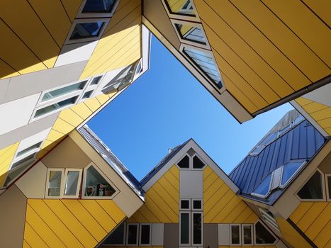 Rotterdam, Netherlands, September 2019: Low angle view of the Cube houses, architecture both designed by architect Piet Blom