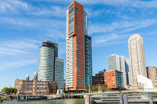 Rotterdam, Netherlands, September 2019: View on the Wilhelminapier with skyscrapers, Landverhuizersplein, Montevideo tower, Rijnhavenbrug and famous hotel New York