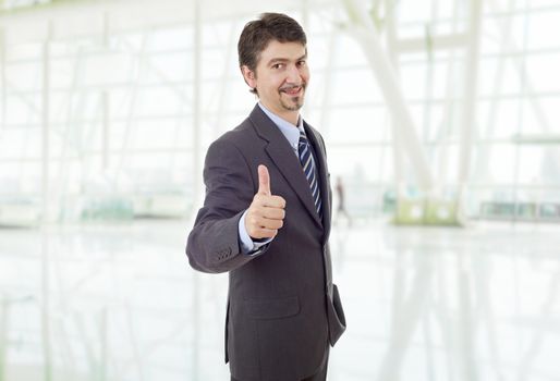 young business man going thumb up, at the office