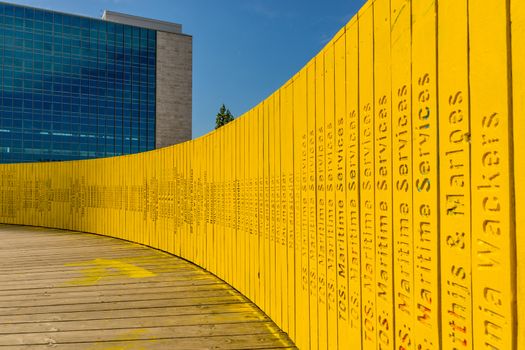 Rotterdam, Netherlands, September 2019: view on the Luchtsingel, a crowdfunded elevated wooden yellow foot bridge, connecting park pompenburg, hofplein and dakakker