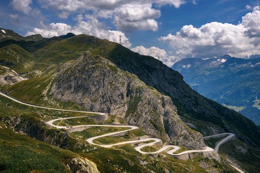 Aerial view of the old road with many serpentines going through the St. Gotthard pass in the Swiss Alps photographed from the Tremola Viewpoint.