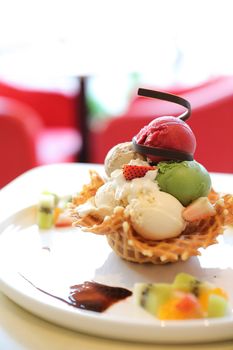 ice cream on waffle and fruit topping