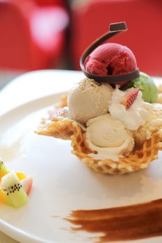 ice cream on waffle and fruit topping