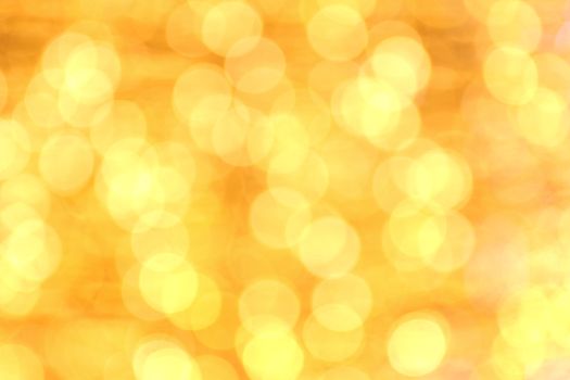 Bokeh background gold yellow colorful of merry christmas, Happy new year bokeh lighting shine on night background, Bokeh glitter light, Golden Luxury backdrop texture, Glittering wallpaper
